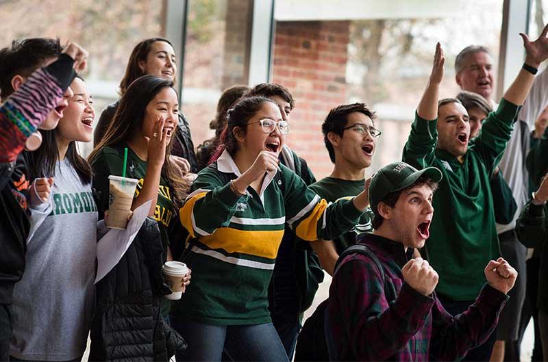 a group of people cheering